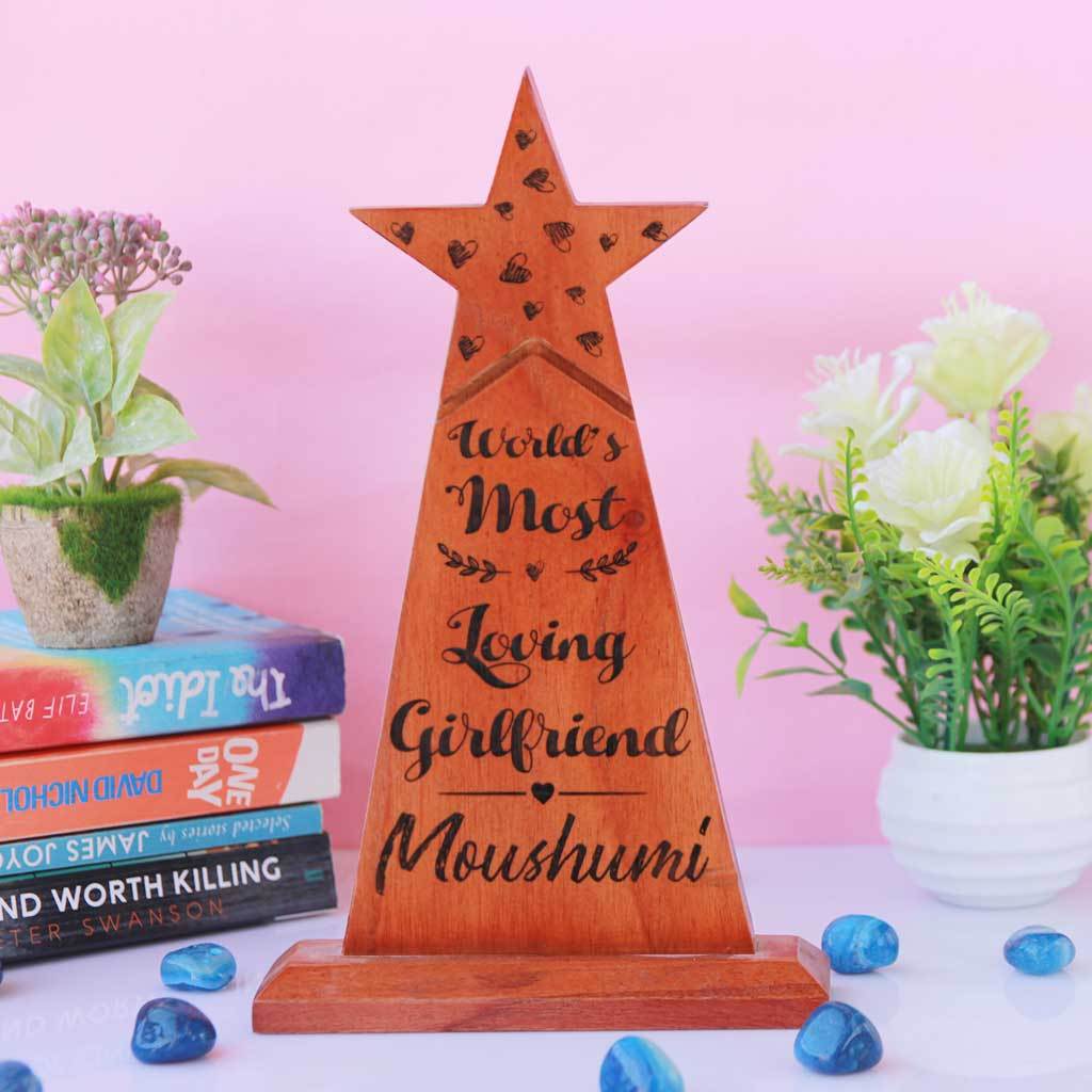 World's Most Loving Girlfriend Star Trophy. This Wooden Award makes a unique gift for girlfriend. These custom trophies are one of the best romantic gifts for her, anniversary gift or birthday gift for girlfriend.
