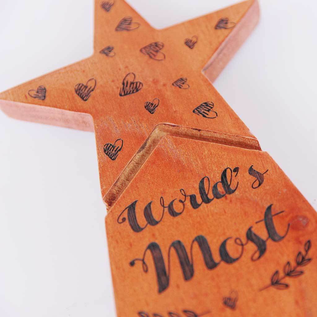 World's Most Loving Girlfriend Star Trophy. This Wooden Award makes a unique gift for girlfriend. These custom trophies are one of the best romantic gifts for her, anniversary gift or birthday gift for girlfriend.