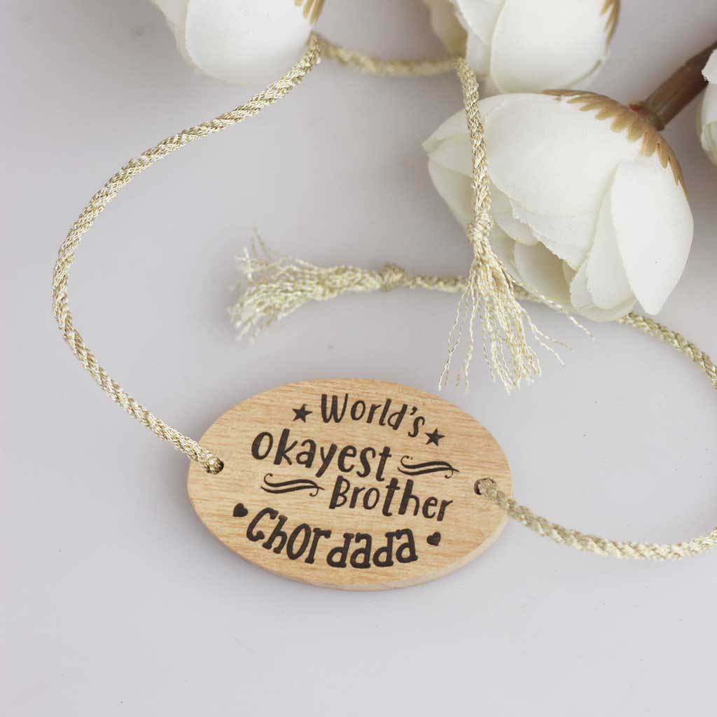 World&#39;s Okayest Brother Personalised Rakhi With Name. This Wooden Rakhi Is The Best Raksha Bandhan Gifts for Brother. Buy Rakhi Online India And Wish Your Brother a Happy Rakhi With Personalized Gifts From The Woodgeek Store.