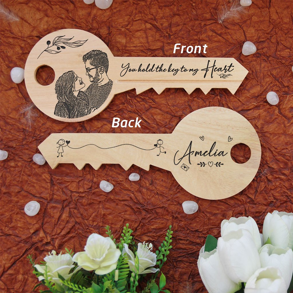 You hold the key to my heart - Key-shaped wooden sign. A custom wood sign in the shape of a key with a wood engraved photo on the front of the key and personalised with a name on the back of the key. This romantic gift is a great personalized gift for boyfriend or girlfriend. This photo gift is also a great anniversary gift and Valentines Day gift.