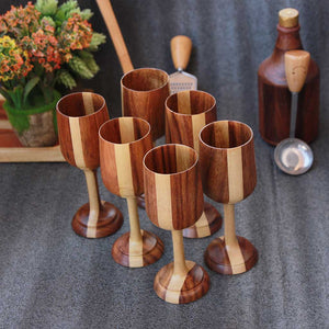 https://www.woodgeekstore.com/cdn/shop/products/wooden-wine-glasses-black-sirish-set-of-6-woodgeekstore_1_300x.jpg?v=1695127154